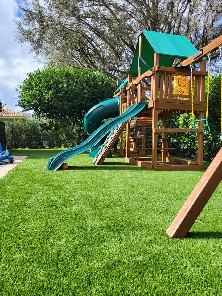 Backyard swing set turf
