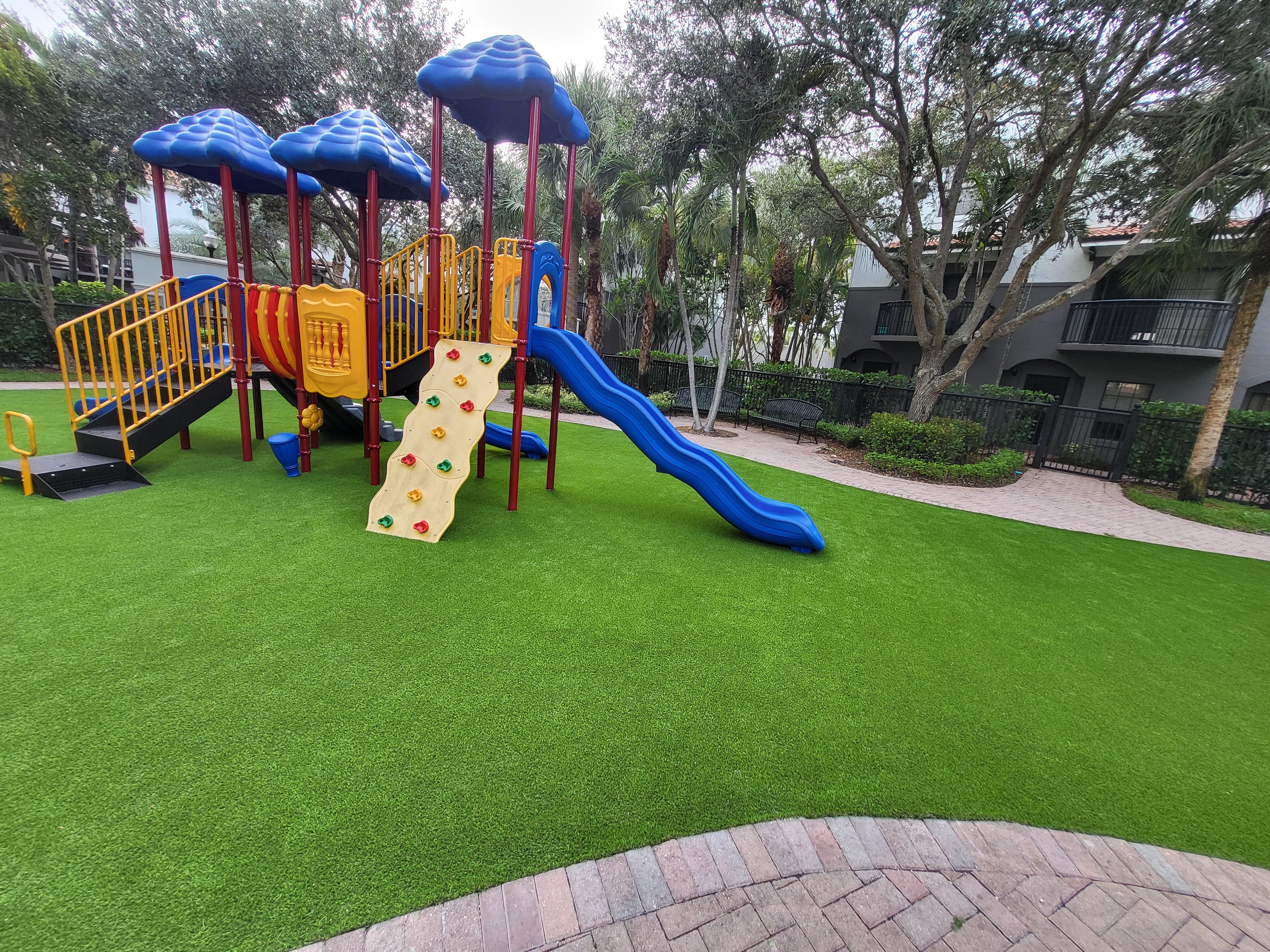 Community playground with artificial turf