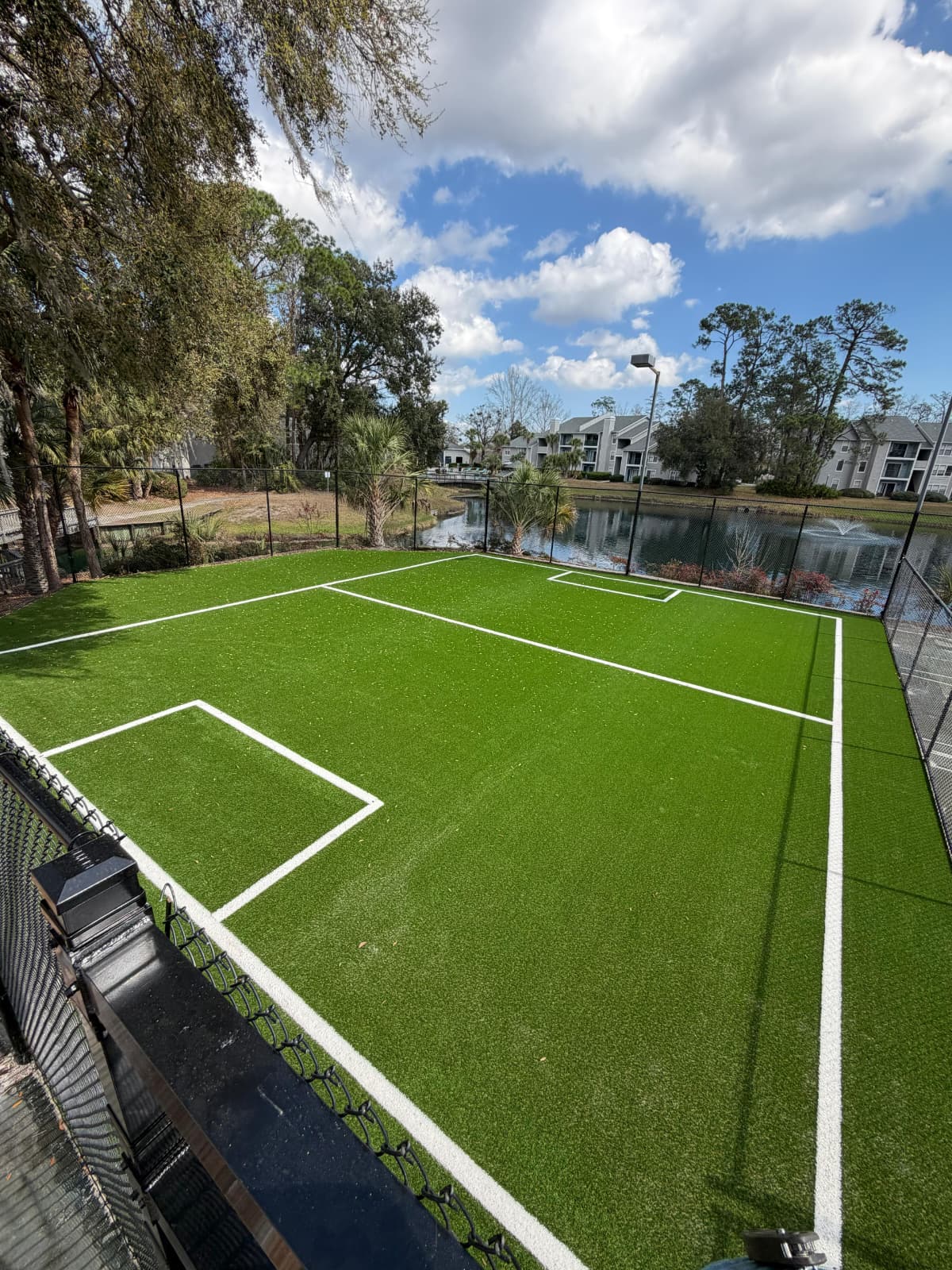 Striped multi-sport soccer field turf